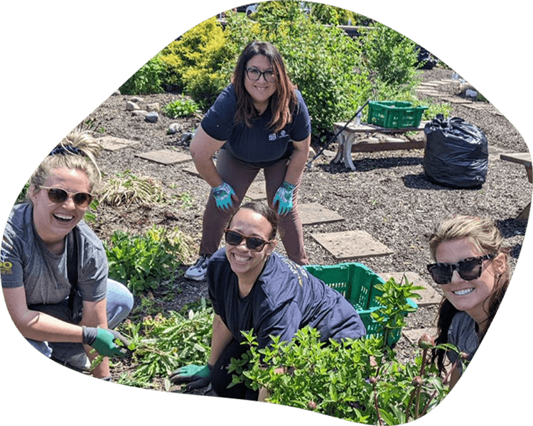 Four persons doing volunteer work