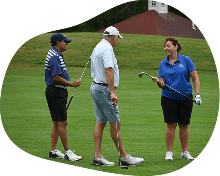 Three persons playing golf